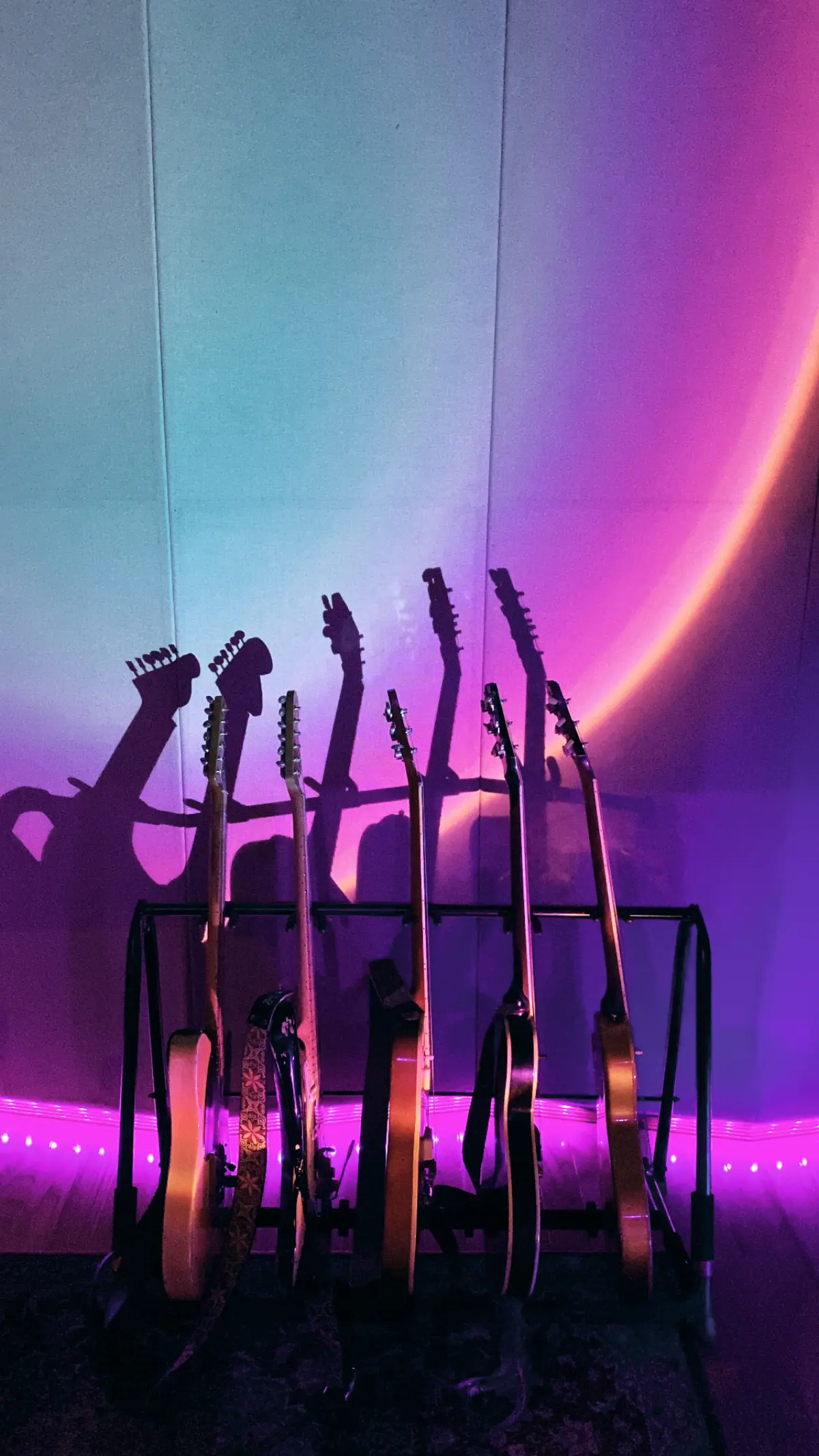 Studio E recording booth with guitars